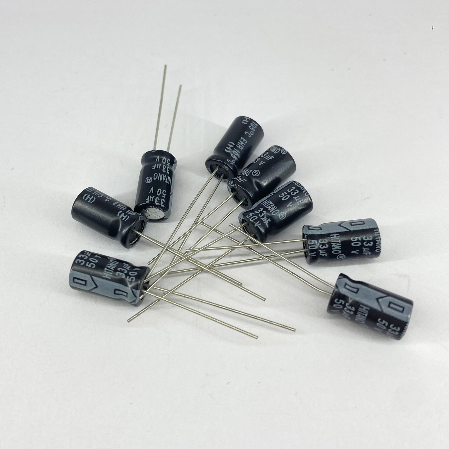Электролитические конденсаторы 33 мкф x 50 В - 6,3x11 мм 105 °C HITANO, фото