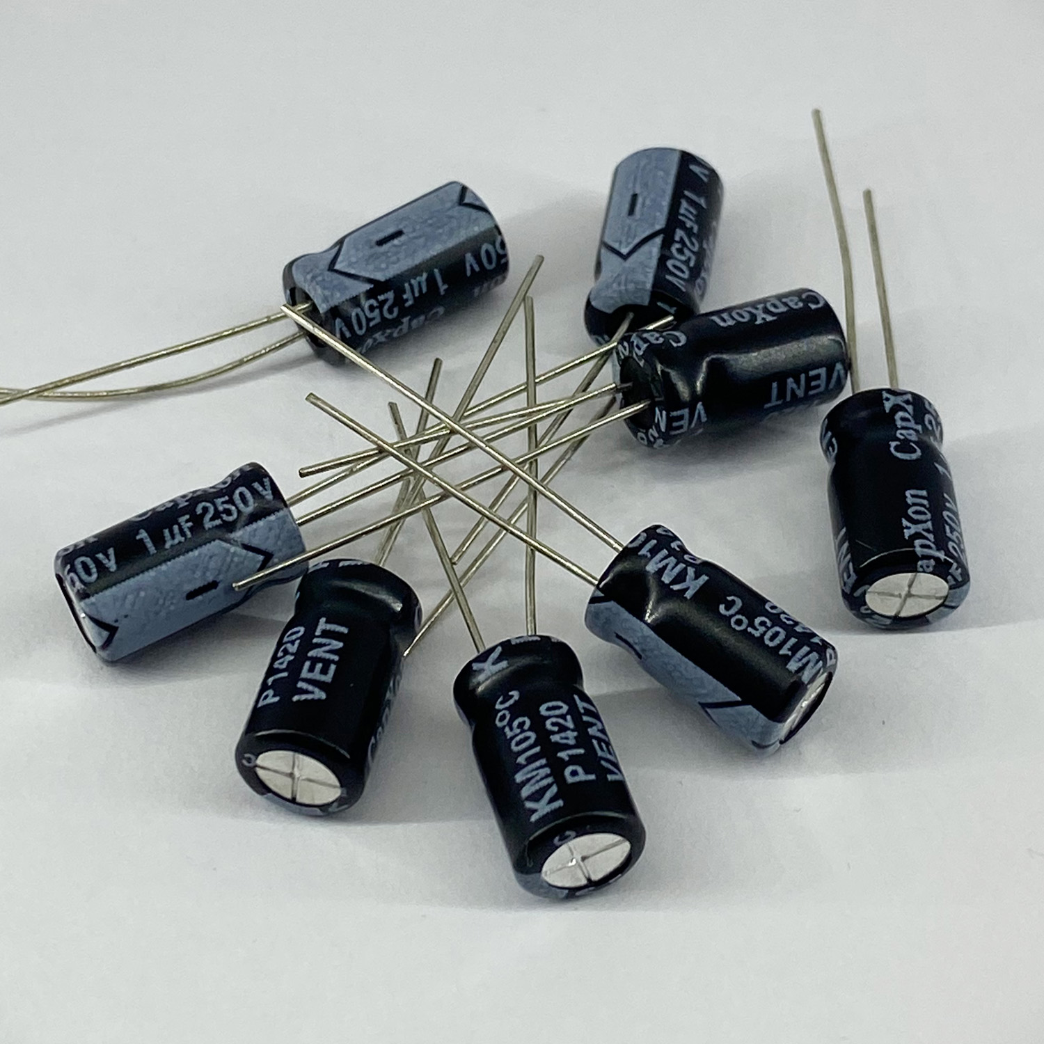 Электролитические конденсаторы 1 мкф x 250 В - 6,3x11 мм 105 °C CapXon, фото